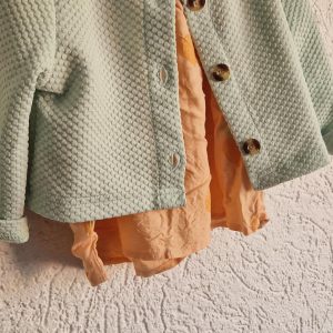 080 86 – Mintkleurig vestje met tuniekje (1125gro)